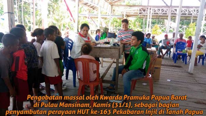 Pengobatan massal oleh Pramuka Kwarda Papua Barat di Pulau Mansinam, menyambt HUT ke-163 Pekabaran Injil di Tanah Papua.