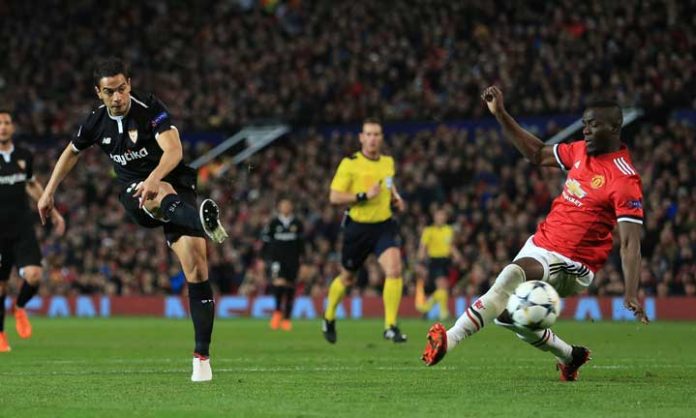 Wissam Ben Yedder saat mencetak gol pertamanya k egawang Manchester United, Rabu (14/3) dini hari tadi.