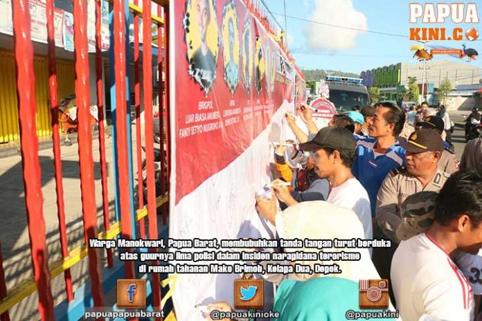 Ribuan Warga Manokwari Teken Spanduk Belasungkawa Gugurnya 5 Polisi