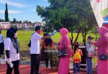 Ketatnya Protokol Kesehatan Saat Upacara 17 Agustus di Aimasi Ketatnya Protokol Kesehatan Saat Upacara 17 Agustus di Aimasi