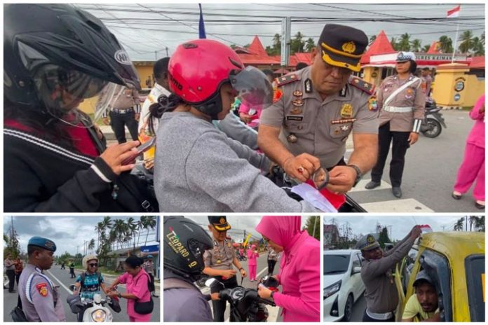 Polres Kaimana Bagi Bendera Merah Putih